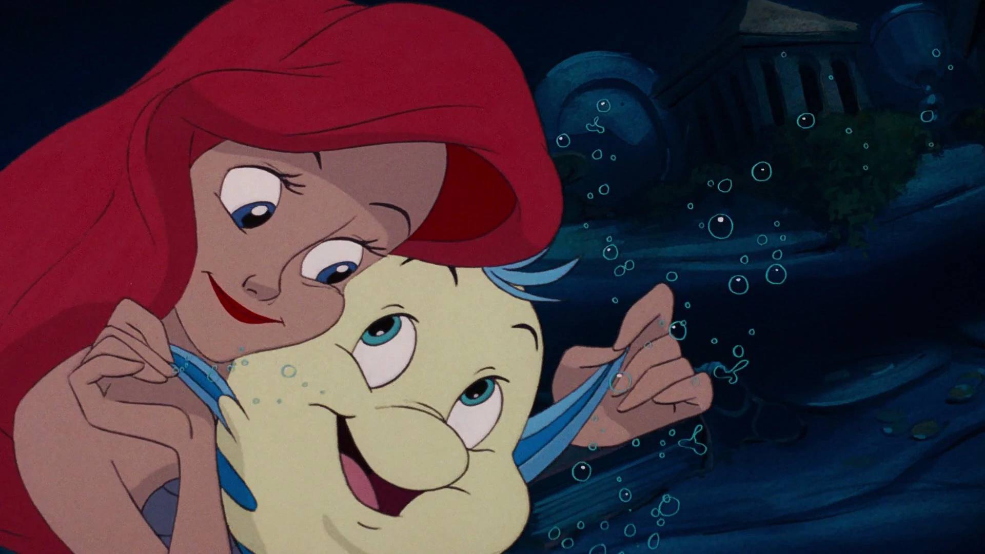 Ariel y Flounder en La sirenita de Disney - animada