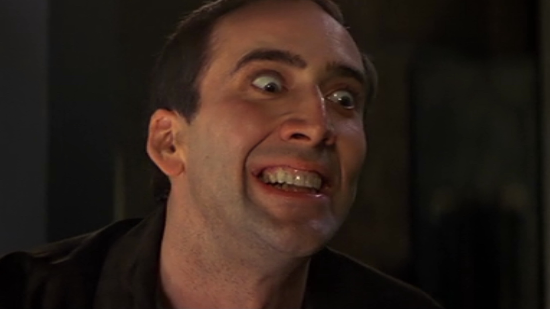 Nicolas Cage Contracara Face Off sonrisa tenebrosa