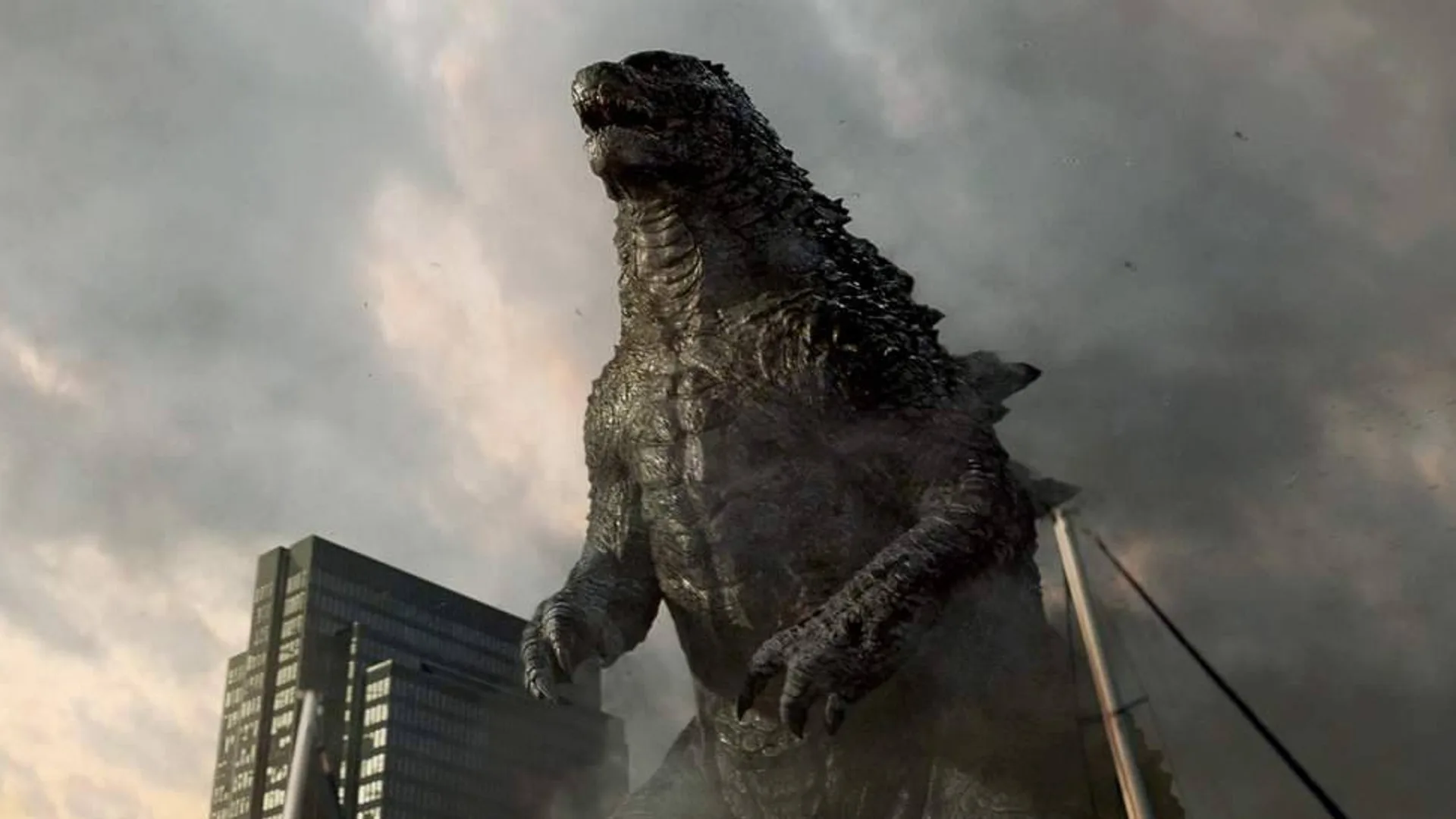 Godzilla rugiendo entre los edificios